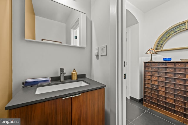 bathroom featuring tile patterned floors and vanity