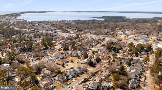 birds eye view of property featuring a residential view and a water view