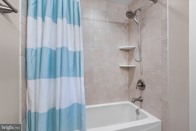 bathroom featuring shower / tub combo with curtain