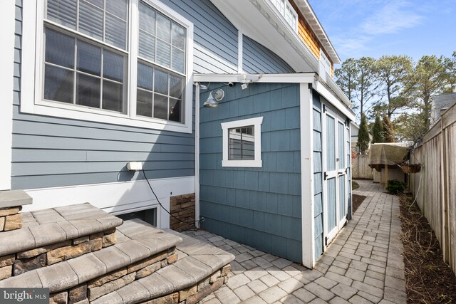 exterior space with a fenced backyard