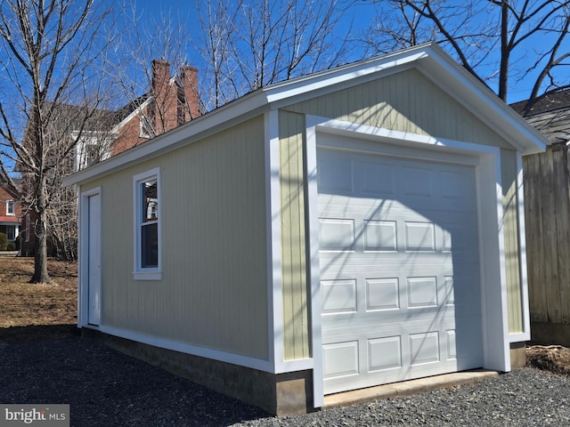 detached garage with fence