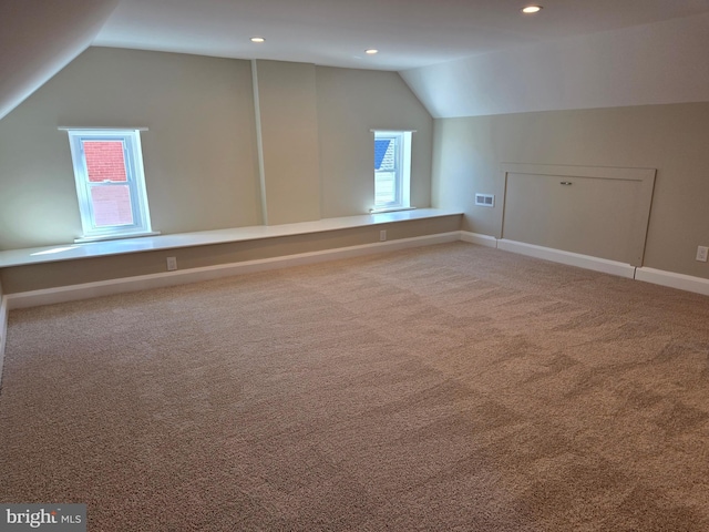 bonus room with visible vents, baseboards, recessed lighting, vaulted ceiling, and carpet flooring