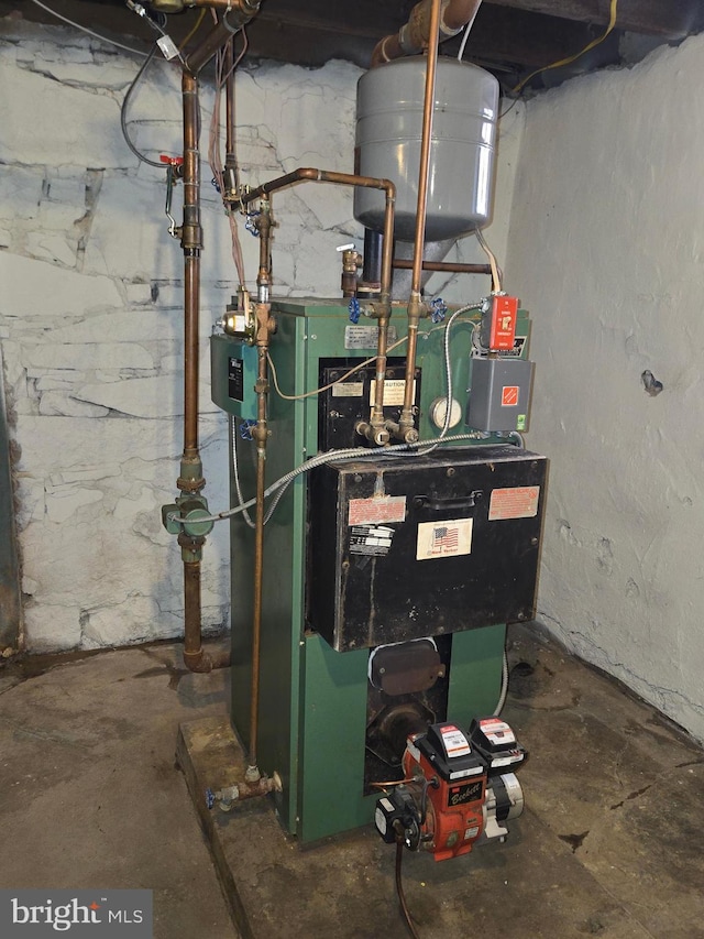 utility room featuring a heating unit