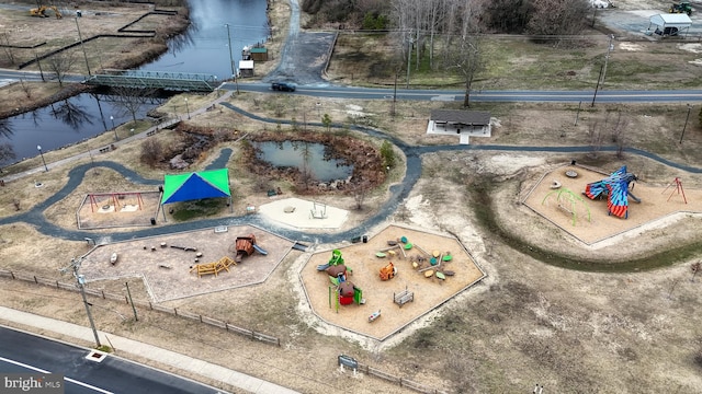 birds eye view of property featuring a water view