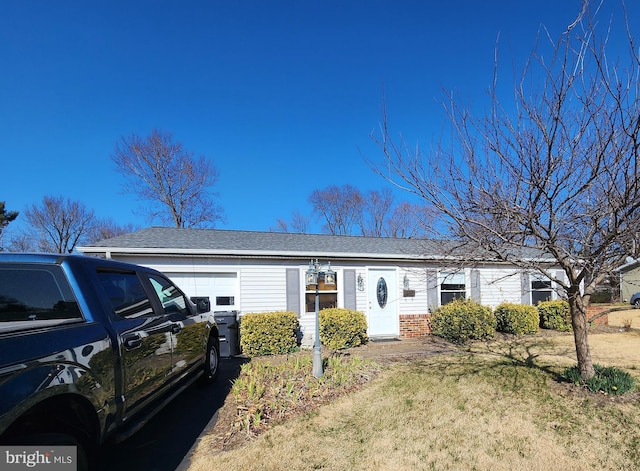 ranch-style home with an attached garage