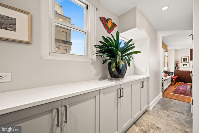 details featuring recessed lighting and baseboards