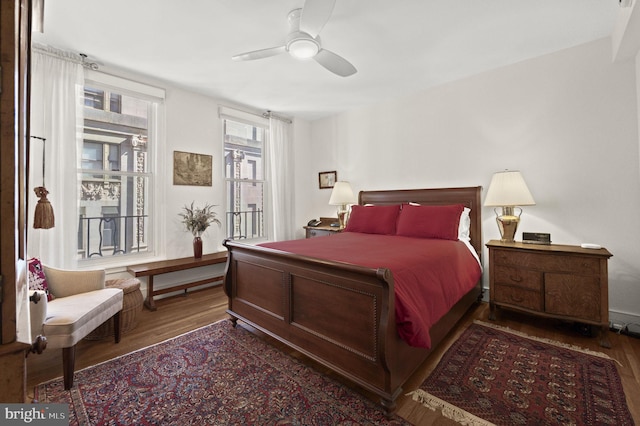 bedroom featuring wood finished floors and ceiling fan