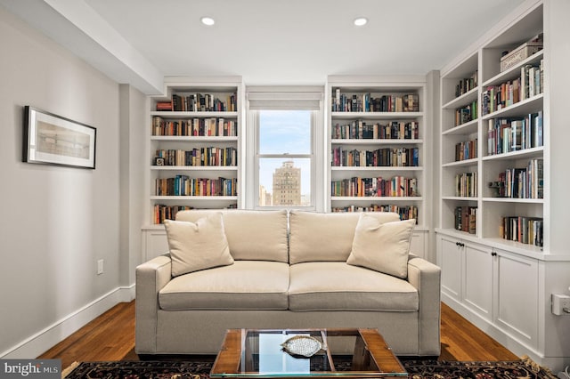 sitting room featuring dark wood-style floors, recessed lighting, and baseboards