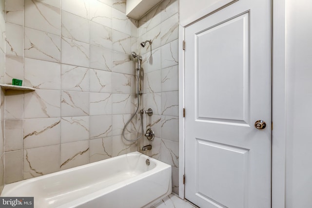 bathroom featuring shower / bathing tub combination and marble finish floor