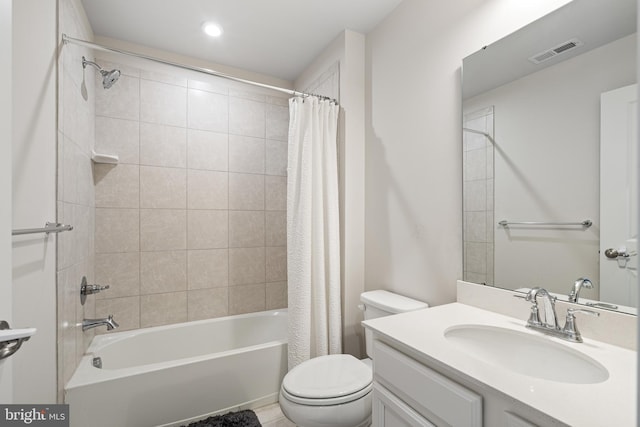 full bath with vanity, toilet, shower / bathtub combination with curtain, and visible vents