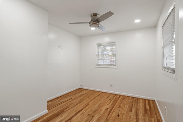 spare room with recessed lighting, baseboards, light wood-style flooring, and a ceiling fan