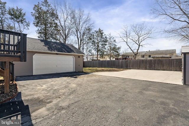 garage featuring fence