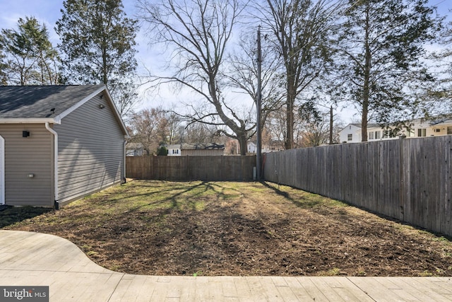 view of yard featuring a fenced backyard