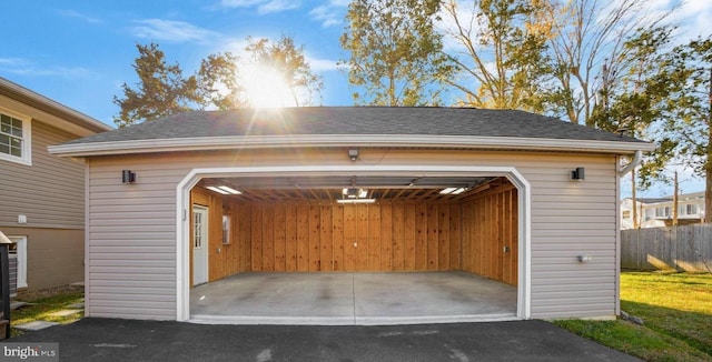 detached garage with fence