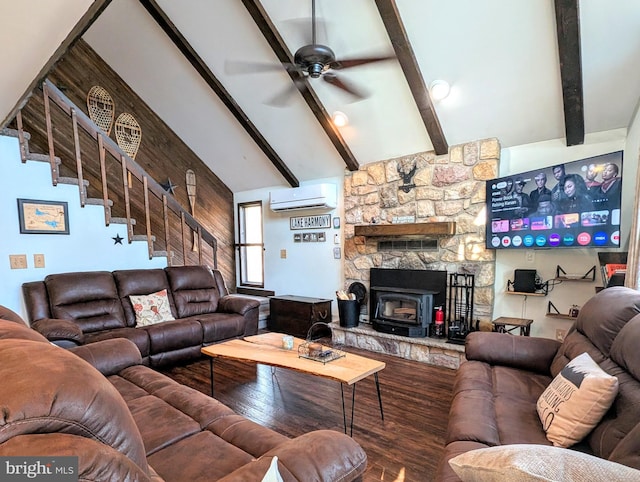 living room featuring a wall unit AC, stairway, wood finished floors, vaulted ceiling with beams, and ceiling fan