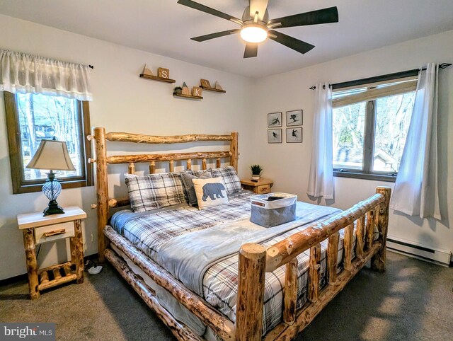 bedroom featuring ceiling fan, multiple windows, carpet flooring, and a baseboard radiator