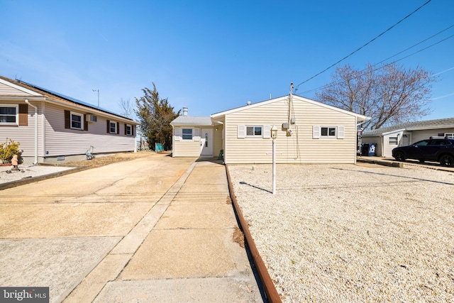 view of front of home with concrete driveway