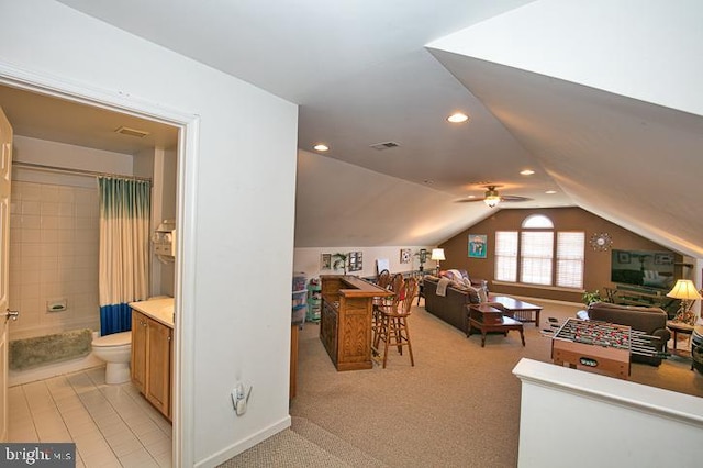 bonus room with visible vents, light colored carpet, lofted ceiling, recessed lighting, and a ceiling fan