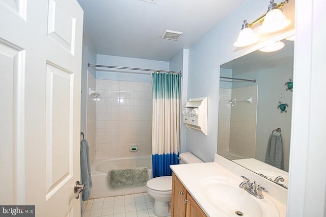 full bathroom featuring vanity, visible vents, shower / bath combo, tile patterned flooring, and toilet