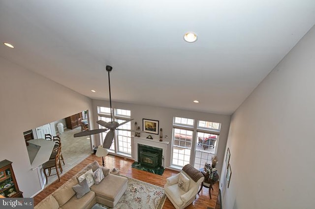 living room featuring recessed lighting and wood finished floors