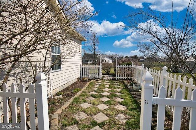 view of yard featuring fence