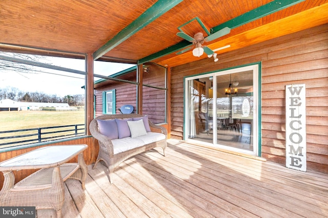 wooden deck with ceiling fan