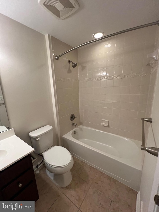 full bathroom with tile patterned floors, visible vents, toilet, shower / bath combination, and vanity