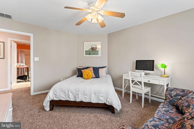 bedroom with visible vents, baseboards, carpet, and a ceiling fan