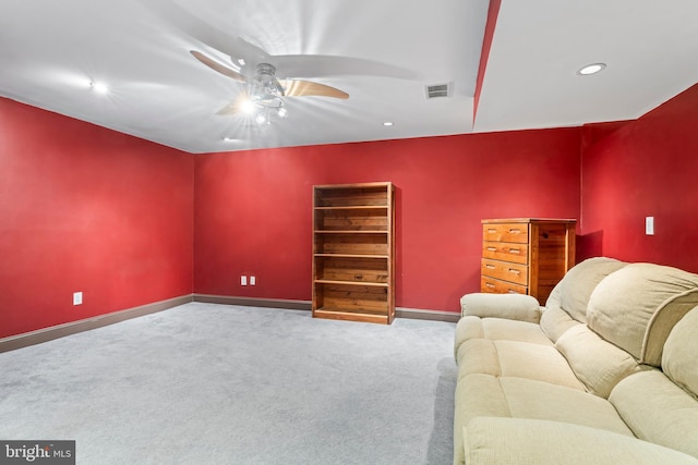 living room featuring a ceiling fan, carpet, visible vents, baseboards, and recessed lighting