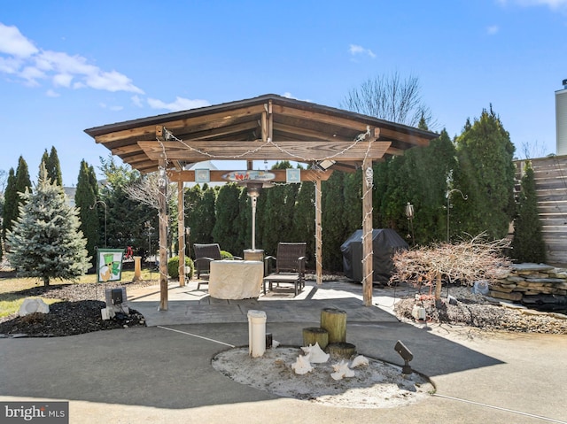 view of patio with grilling area and outdoor dining space