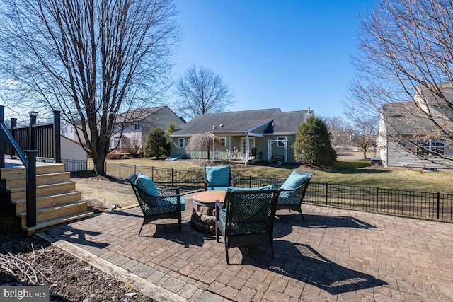 view of patio featuring fence