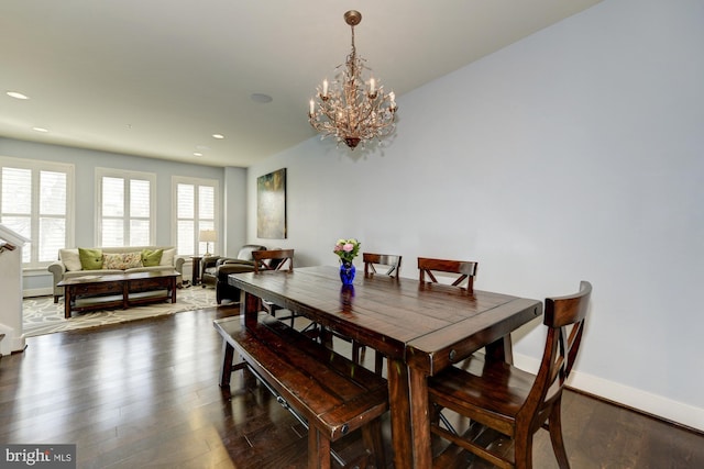 dining space with recessed lighting, a chandelier, baseboards, and dark wood-style floors