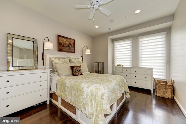 bedroom featuring dark wood finished floors, visible vents, recessed lighting, and baseboards