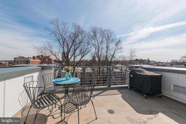 view of patio / terrace featuring visible vents, a balcony, and area for grilling