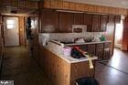 kitchen featuring light countertops