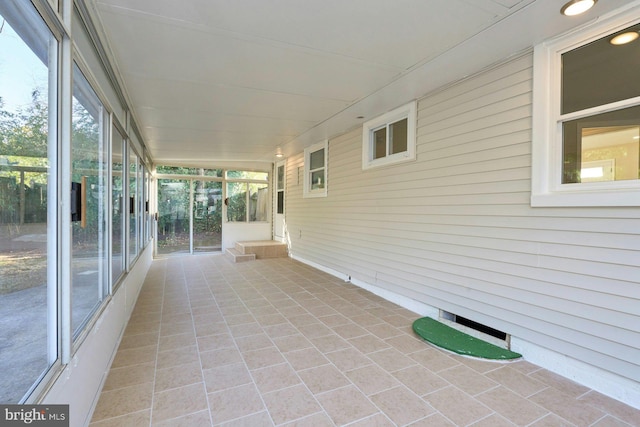 view of unfurnished sunroom