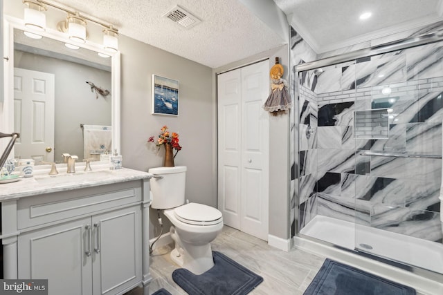 bathroom with visible vents, toilet, a stall shower, a textured ceiling, and vanity