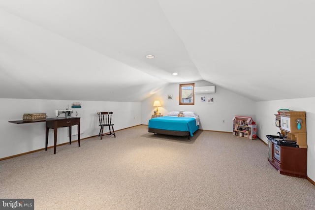 bedroom featuring vaulted ceiling, baseboards, and a wall mounted air conditioner