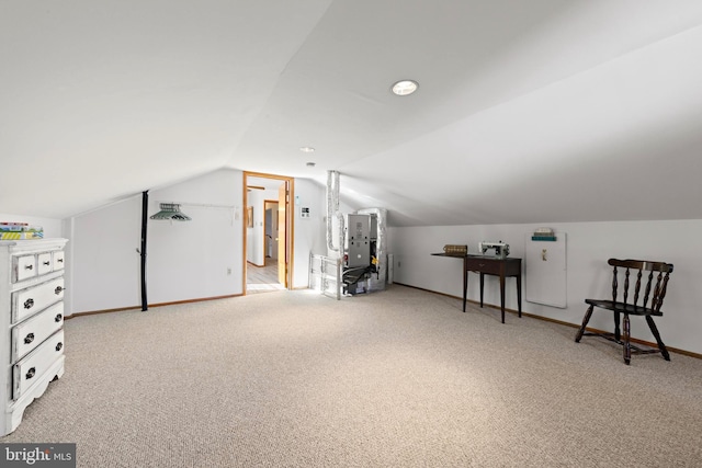 bonus room with carpet flooring, baseboards, and lofted ceiling