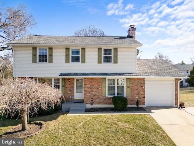 traditional-style home with concrete driveway, a front yard, a garage, brick siding, and a chimney