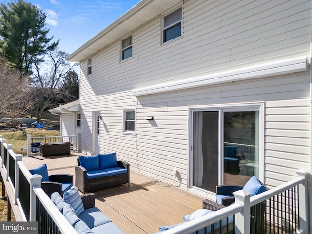 wooden deck with outdoor lounge area