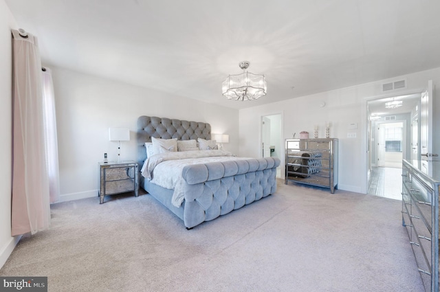 bedroom with visible vents, baseboards, carpet, and a chandelier