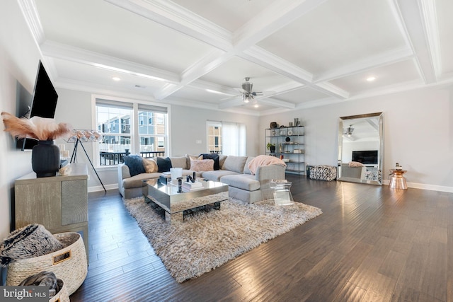 living area with beamed ceiling, coffered ceiling, baseboards, and dark wood-style flooring