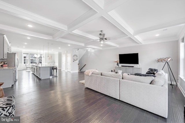 living area featuring beam ceiling, recessed lighting, dark wood-type flooring, and coffered ceiling