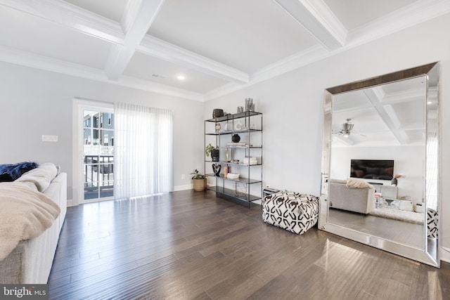 living area featuring beamed ceiling, baseboards, coffered ceiling, and wood finished floors