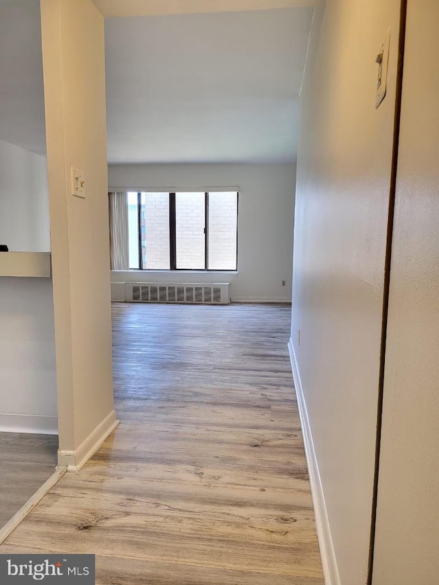3100 S Manchester St Unit 909, Falls Church, VA 22044 - hallway featuring wood finished floors and baseboards
