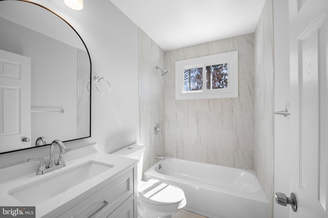 full bath featuring vanity, toilet, and shower / bath combination