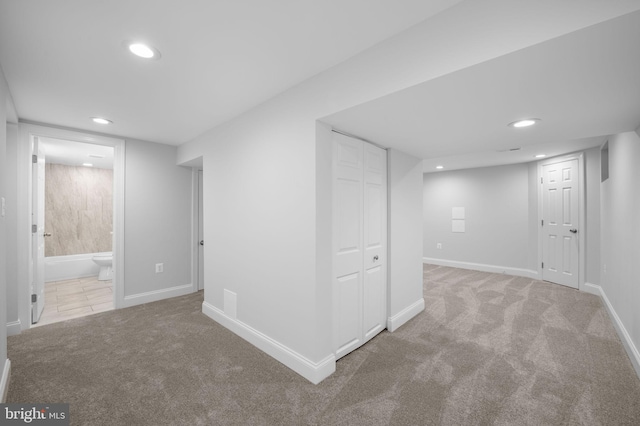 finished basement featuring recessed lighting, baseboards, and carpet floors