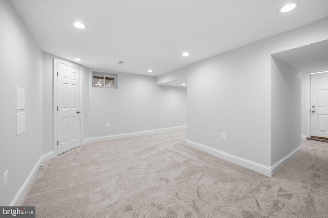 finished basement with recessed lighting, baseboards, and carpet