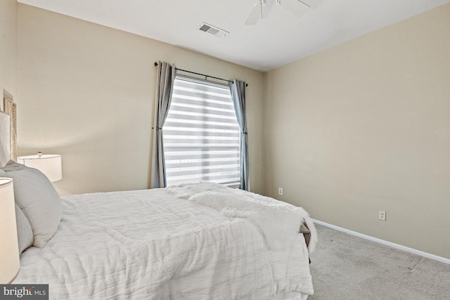 bedroom featuring visible vents, ceiling fan, baseboards, and carpet